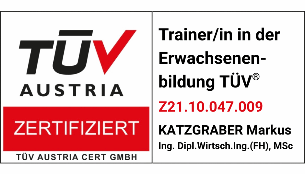 a TÜV sign with black and red text